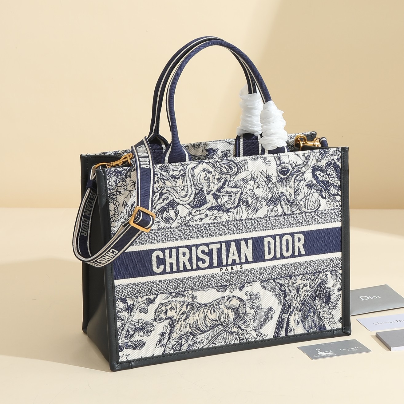 Medium Dior Book Tote White and Navy Blue Toile de Jouy Sauvage Embroidery with Navy Blue Calfskin M1324CE