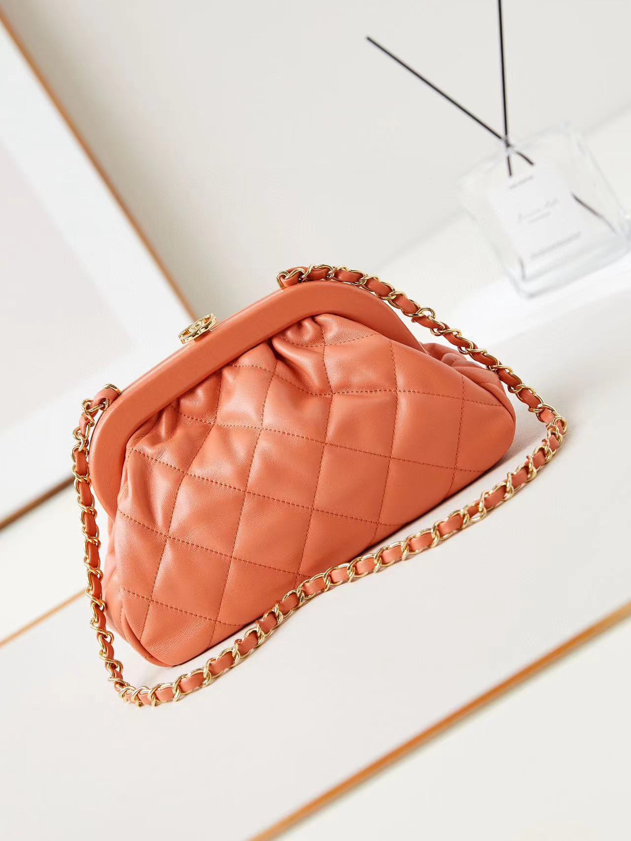 Chanel 24A CLUTCH WITH CHAIN AP1940 orange